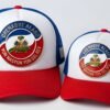 royal blue and white trucker hats featuring a custom metal patch of the Haitian coat of arms